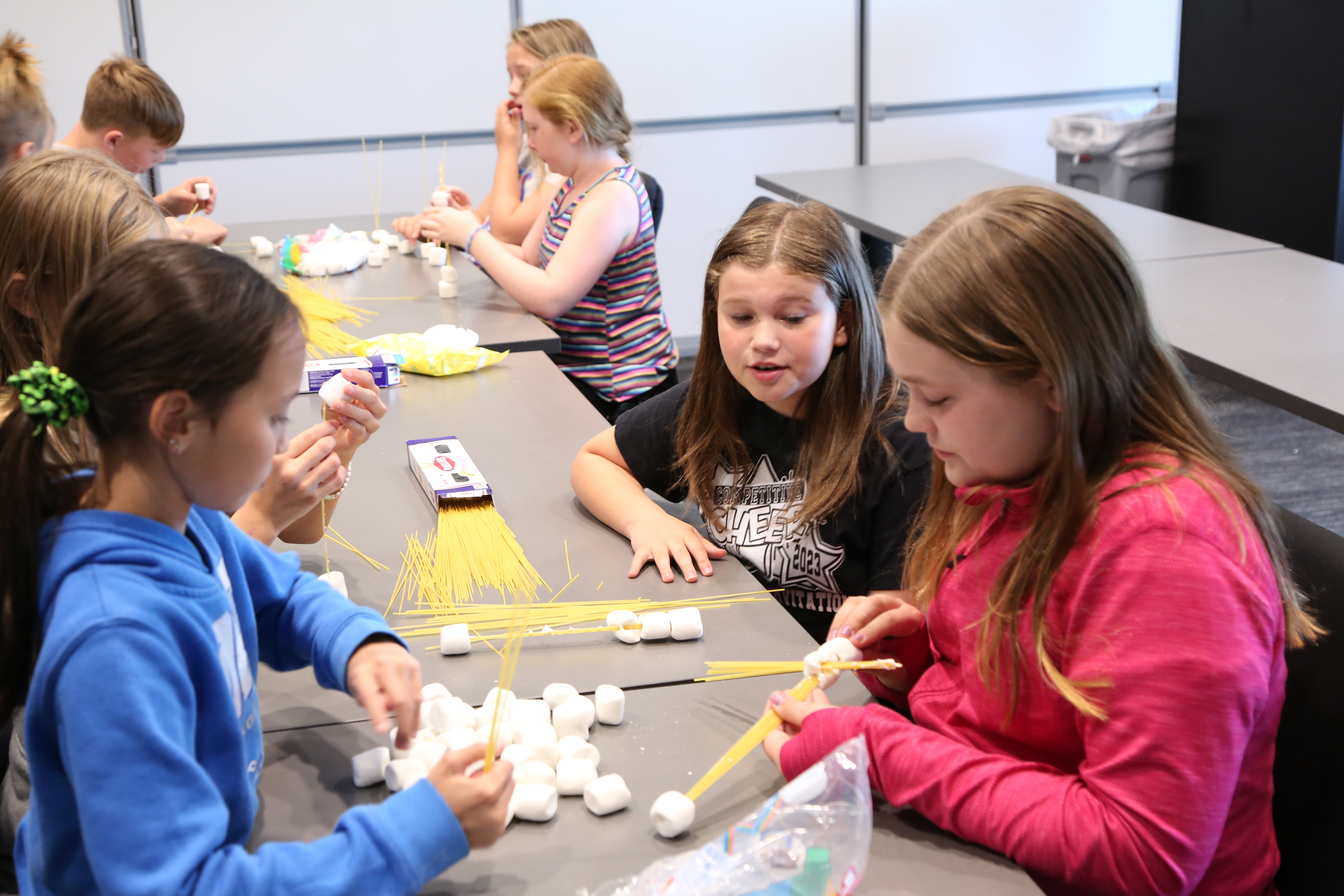 Sandy Hill students build spaghetti towers as part of an early talent recruiting project at Gentex. 